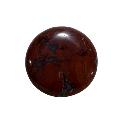 Genuine Brecciated Jasper cabochon with distinctive natural color variations and a glossy polished surface.