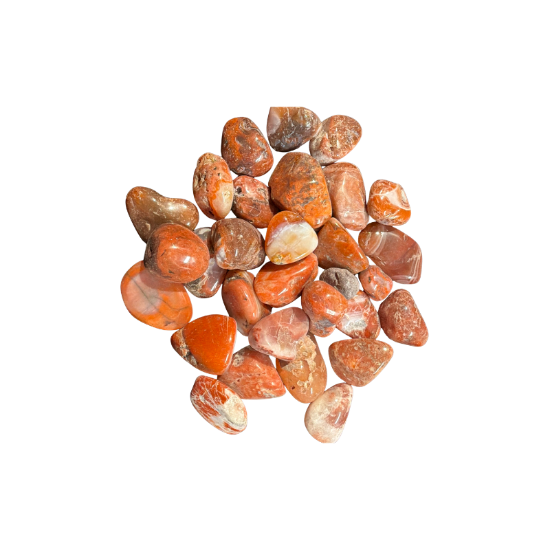 Carnelian Agate tumbled stones in warm orange, cream, and banded natural tones on a black background