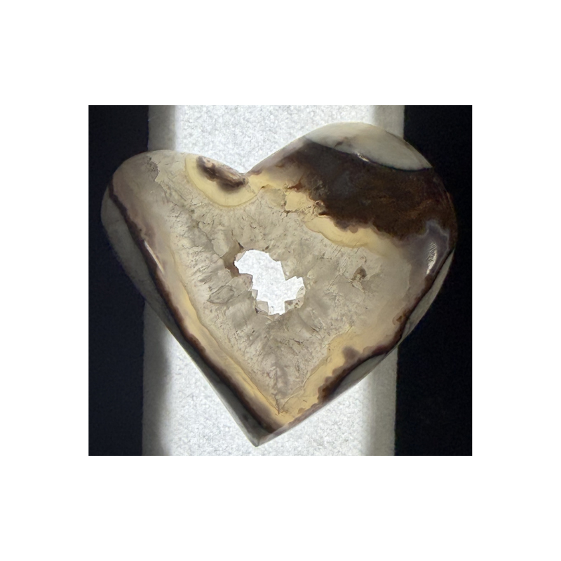 Heart-shaped Chalcedony Agate cabochon featuring natural cream, tan, gray, and brown banding with a polished finish for jewelry making