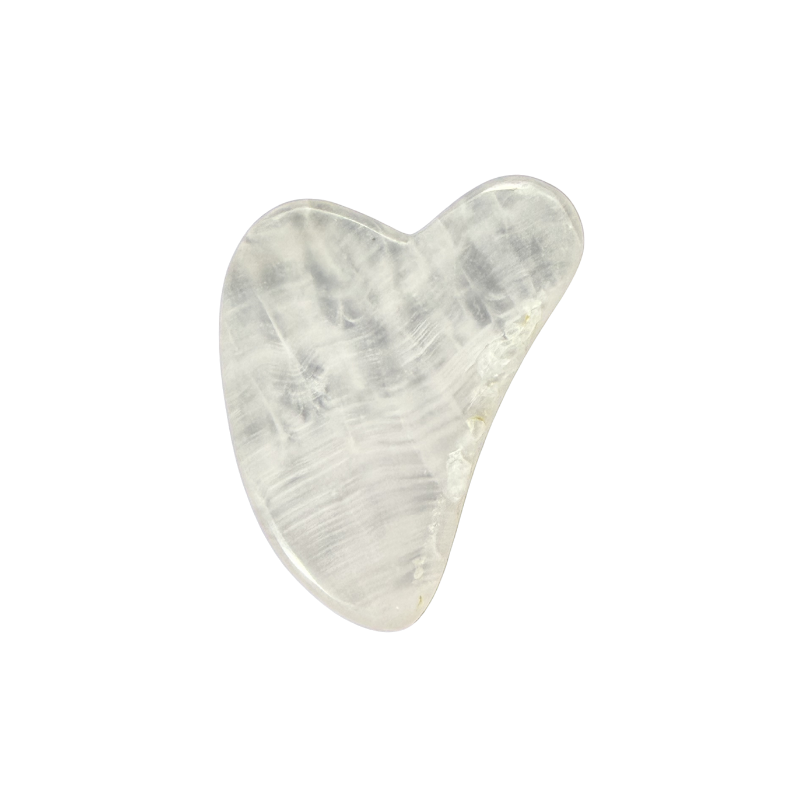 Polished Rose Quartz heart-shaped massage stone featuring natural soft pink coloring and a smooth finish.
