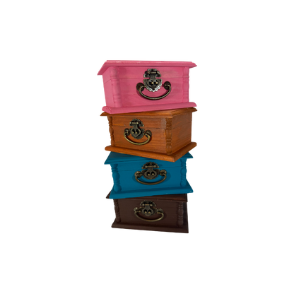 Four wooden stone treasure boxes shown together in rose pink, raw sienna, turquoise blue and burnt umber