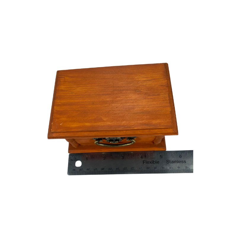 Wooden stone treasure box shown with length measurement to show the overall size of the keepsake box