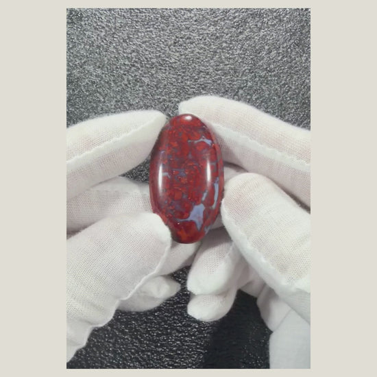 Product showcase video of a polished Brecciated Jasper cabochon highlighting its natural patterns, smooth finish, and handcrafted quality.