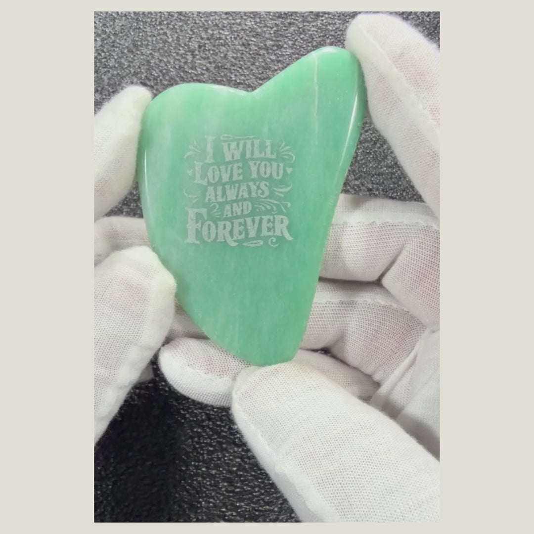 Rotating video of an engraved Green Aventurine heart-shaped massage stone showcasing the "I Love You Always and Forever" engraving, polished finish, and natural green color.