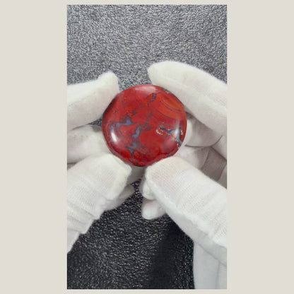 Rotating view of a one-of-a-kind Brecciated Jasper cabochon highlighting its natural beauty and polished craftsmanship.