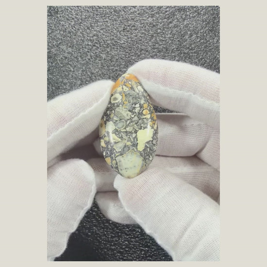 Video showing Maligano Jasper cabochon number 3 with earthy natural stone markings