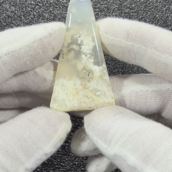 Close-up video of Natural Chalcedony Agate Cabochon highlighting natural banding and glossy finish